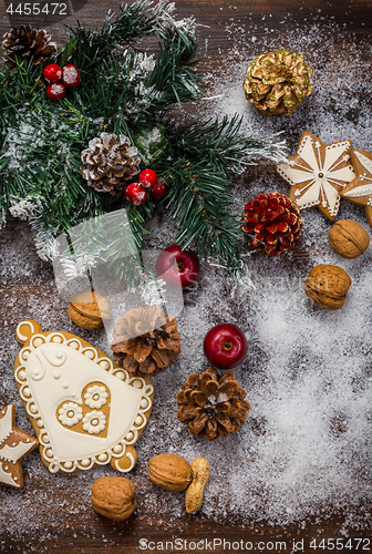 Image of Christmas background with branch and gingerbread