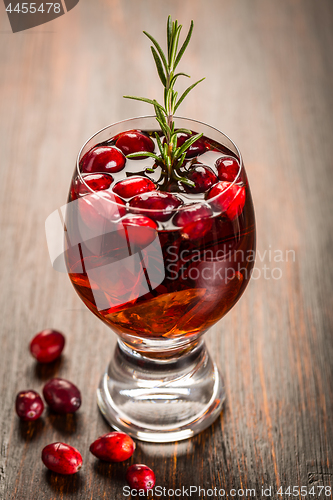 Image of Mulled wine or hot punch with cranberries for Xmas