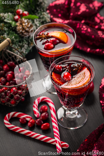Image of Mulled wine or hot punch with cranberries for Xmas