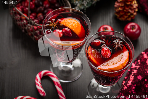 Image of Mulled wine or hot punch with cranberries for Xmas