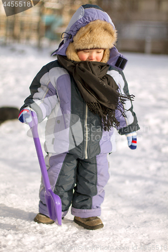 Image of Boy enjoying the first snow