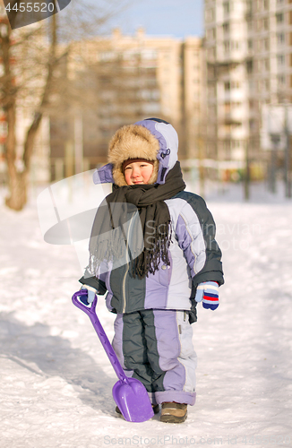 Image of Boy enjoying the first snow