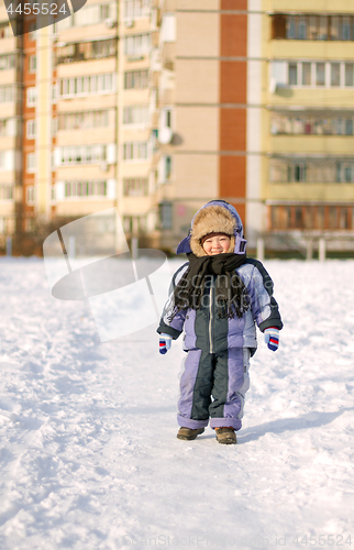 Image of Boy enjoying the first snow