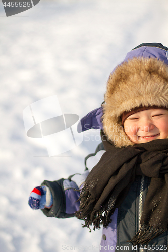 Image of Boy enjoying the first snow