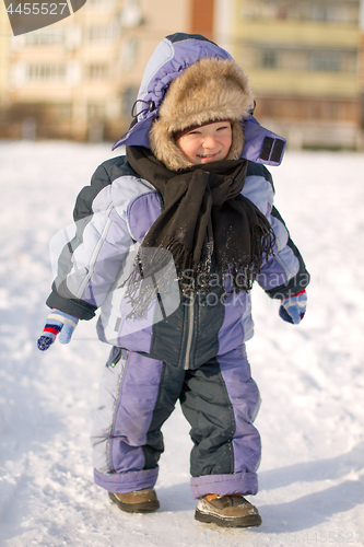 Image of Boy enjoying the first snow