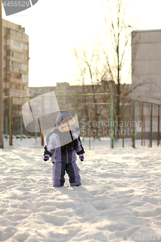 Image of Boy enjoying the first snow