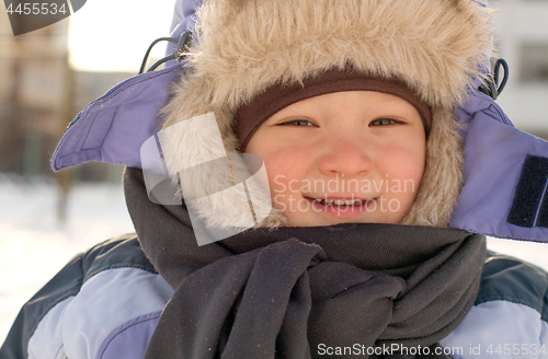 Image of Boy enjoying the first snow