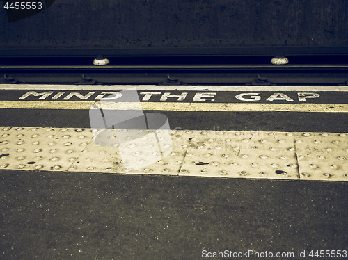 Image of Vintage looking Mind the gap in London