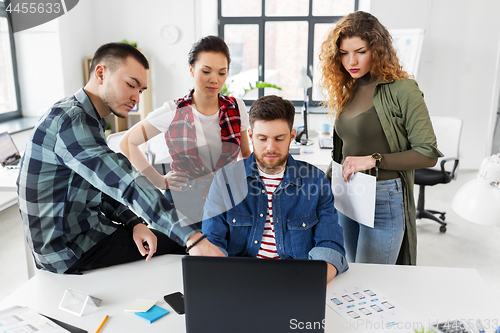 Image of creative team working on user interface at office