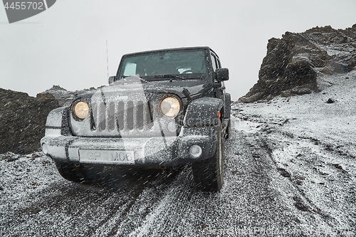 Image of Jeep Wrangler on Icelandic terrain with snow