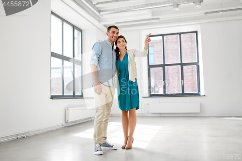 Image of happy couple at new home