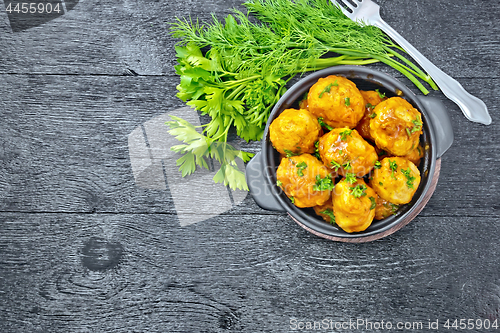 Image of Meatballs in brazier on board top