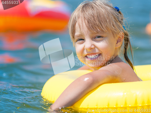 Image of Little girl in sea 