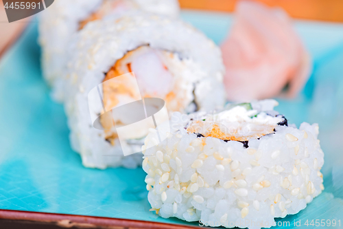 Image of California maki sushi with tempura shrimp