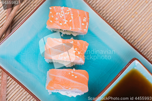 Image of Top view to california maki sushi with salmon