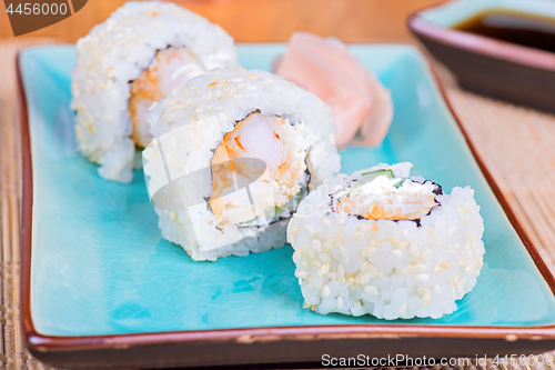 Image of California maki sushi with tempura shrimp