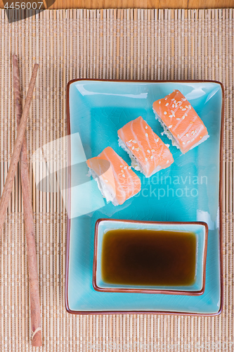 Image of Top view to california maki sushi with salmon