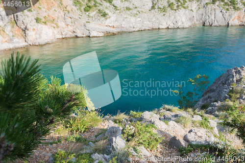 Image of Rocky beach, transparent blue sea