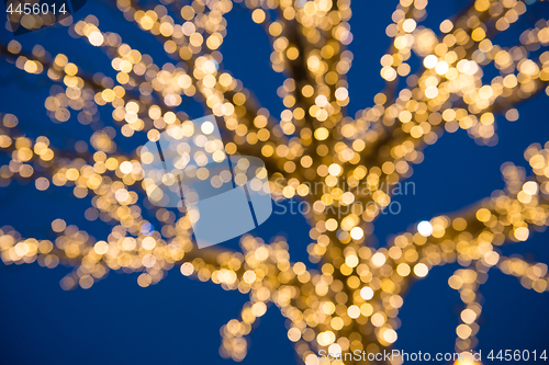 Image of Blurred golden lights Christmas Tree