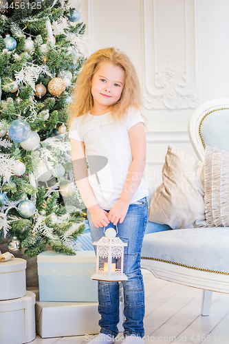 Image of Cute girl and Christmas Tree