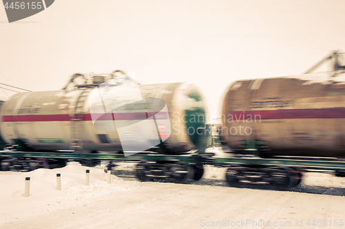 Image of Train with oil tanks moving.