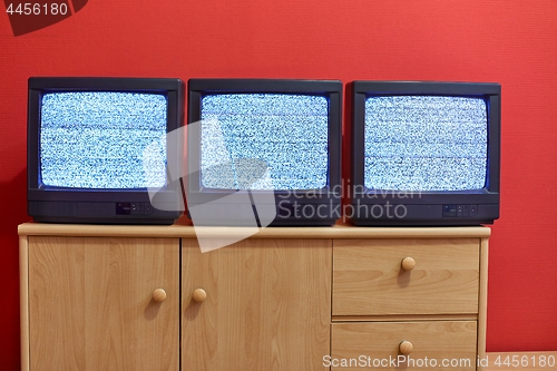 Image of Three old TV sets