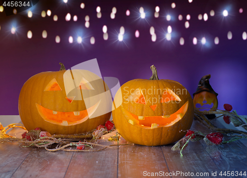 Image of close up of halloween pumpkins on table