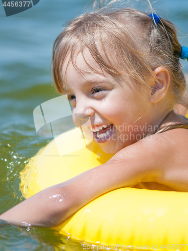 Image of Little girl in sea 