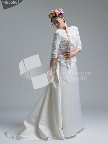 Image of Portrait of beautiful young women in wedding dress