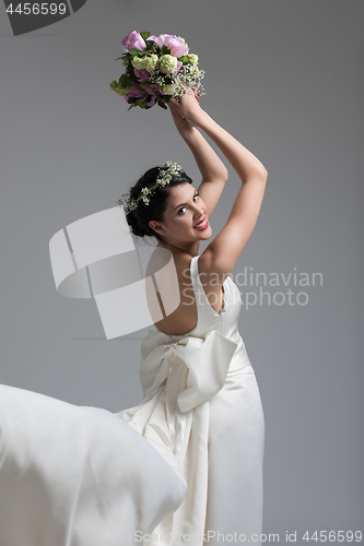 Image of bride with a bouquet  isolated on white background