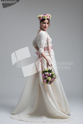 Image of bride with a bouquet  isolated on white background