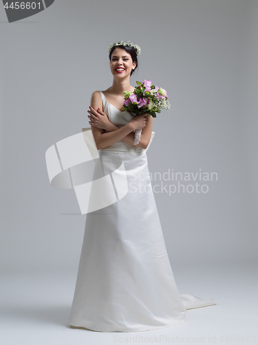 Image of bride with a bouquet  isolated on white background