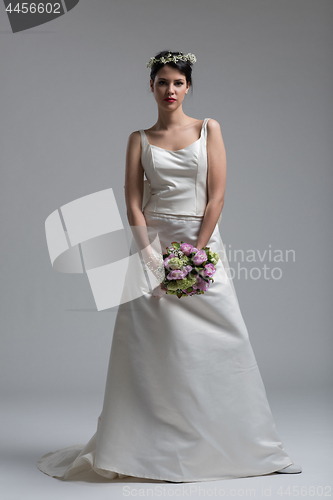 Image of bride with a bouquet  isolated on white background