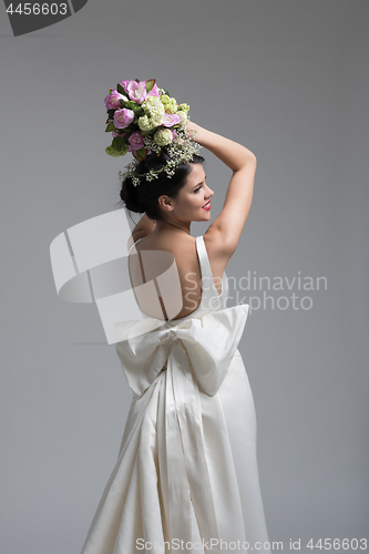 Image of bride with a bouquet  isolated on white background