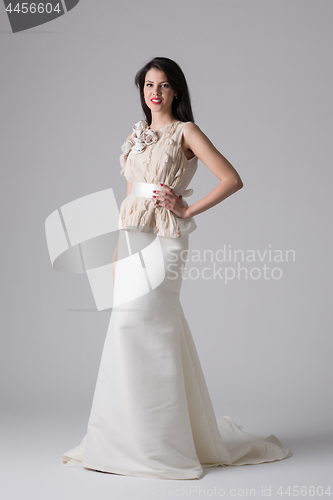 Image of Portrait of beautiful young women in wedding dress