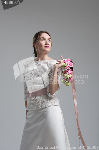 Image of bride with a bouquet  isolated on white background