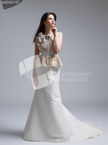 Image of Portrait of beautiful young women in wedding dress