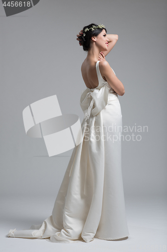 Image of Portrait of beautiful young women in wedding dress