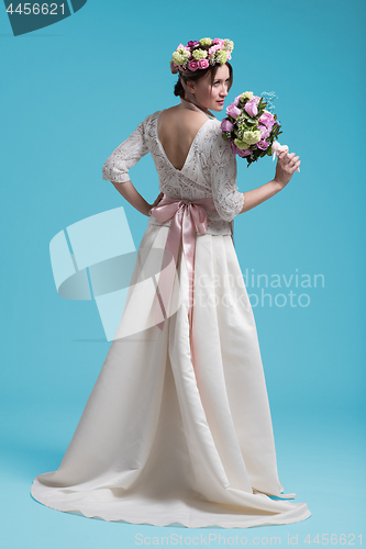 Image of beautiful young women in wedding dress