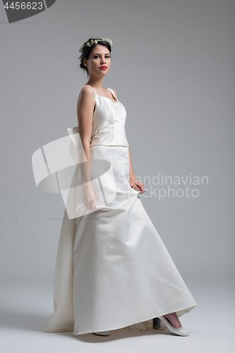 Image of Portrait of beautiful young women in wedding dress