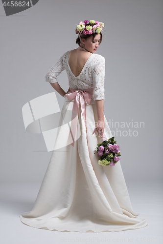 Image of bride with a bouquet  isolated on white background