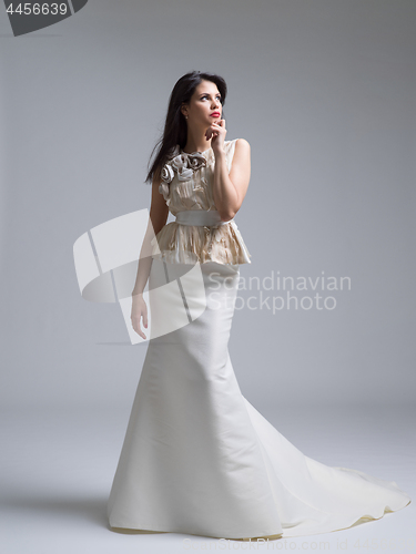 Image of Portrait of beautiful young women in wedding dress