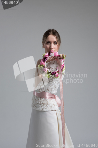 Image of bride with a bouquet  isolated on white background