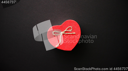 Image of Heart shaped Valentines Day gift box on black bacground.