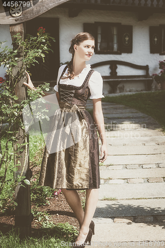 Image of Young bavarian woman in holiday dirndl