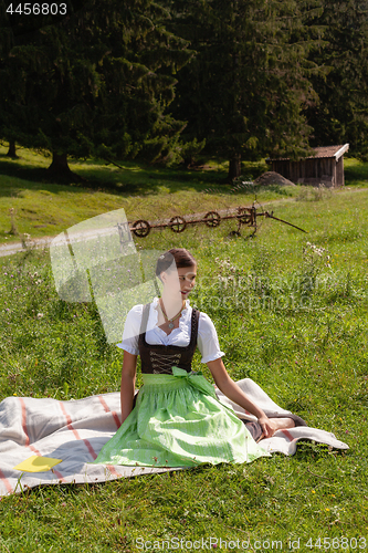 Image of Young girl Bavarian traditional dressed.