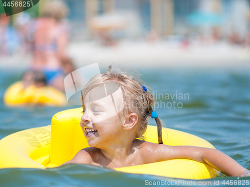 Image of Little girl in sea 