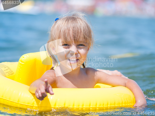 Image of Little girl in sea 