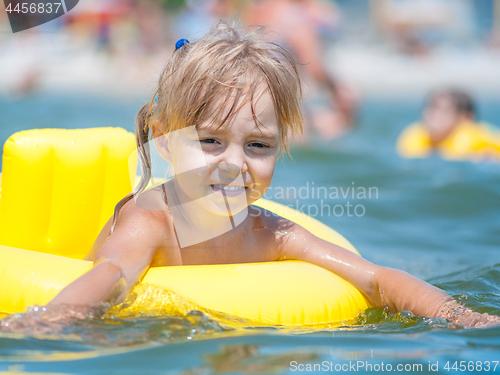 Image of Little girl in sea 