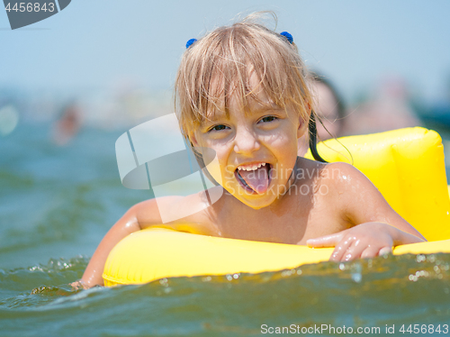 Image of Little girl in sea 